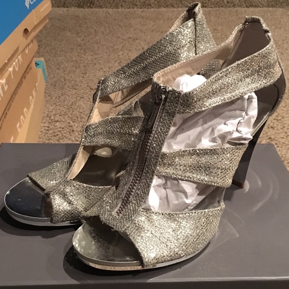 Michael Kors New without box size 8 silver heels